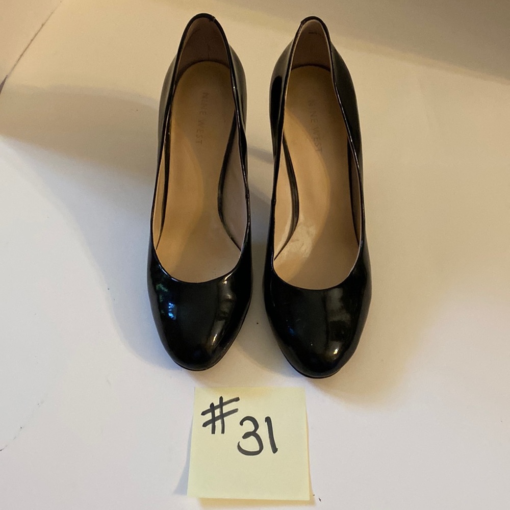 Nine West black patent leather heels size 8. Heels are 4 inches.